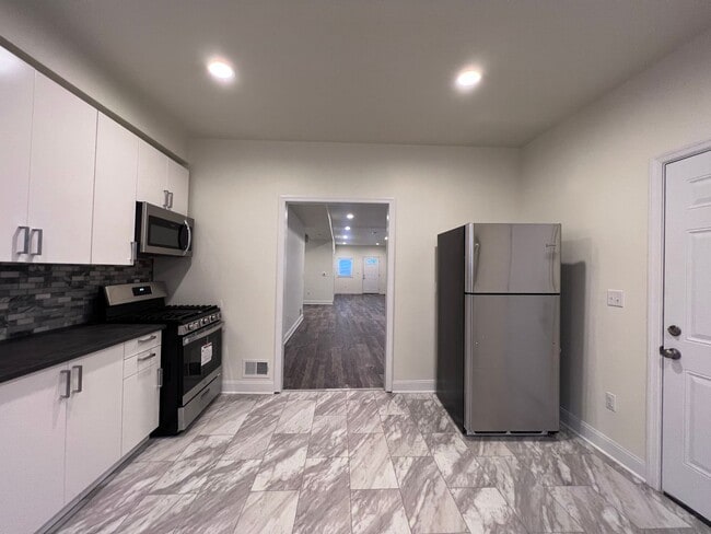 Photo - Updated 5BR 3bath house with off street parking!