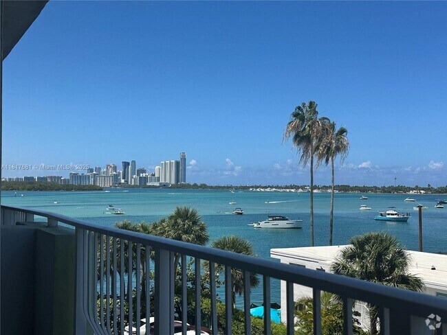 Building Photo - 10350 W Bay Harbor Dr Unit 4F + DEN Rental