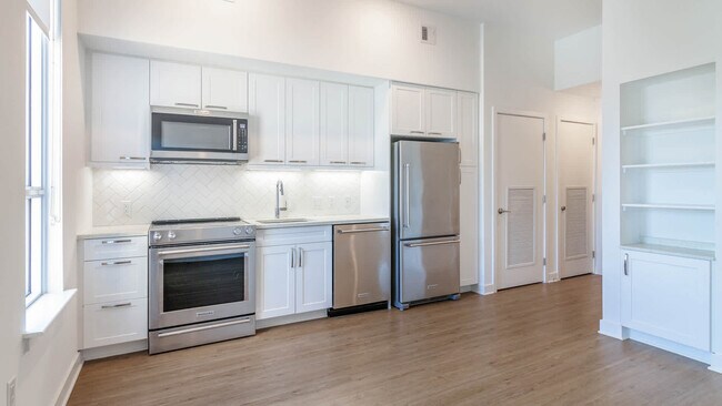 Kitchen with Stainless Steel Appliances and Quartz Countertops