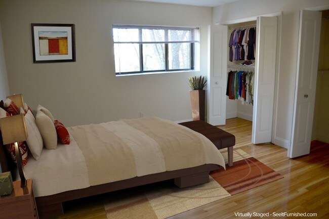 Large Closets and Hardwood Floors in Bedroom