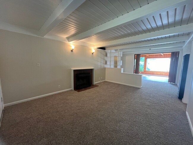 Photo - 2 bed 1 bath single family home with back yard and garage space