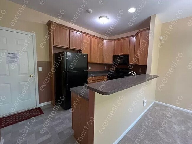 Photo - 2 Bedroom Condo with loft and basement in ...