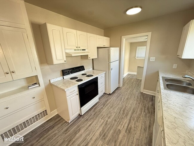 Photo - Move-In Ready 3-Bedroom with Fresh Finishes & Basement Space