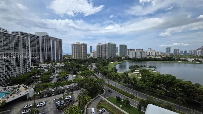 Building Photo - 3675 N Country Club Dr Unit 1504