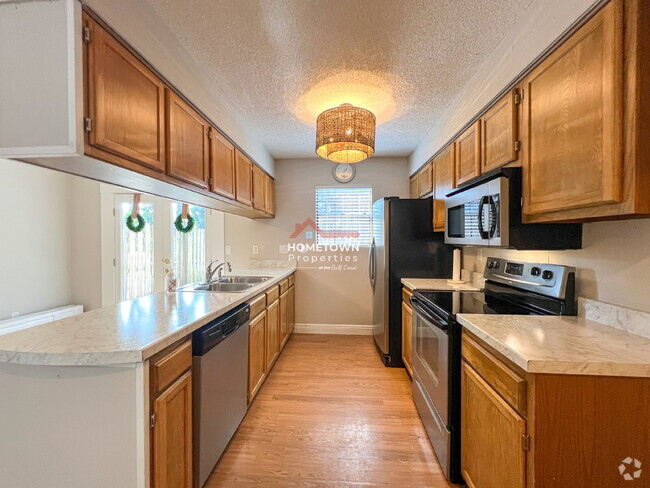 Building Photo - Location! 2-Bed Townhouse with 2.5 Baths i... Unit Apt 42