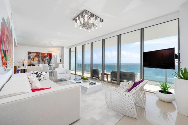 Building Photo - 5875 Collins Ave Unit 1202 Rental