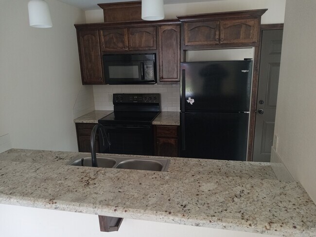 Photo - 317 N Bentsen Palm Dr Unidad 1