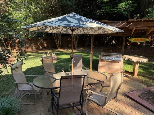 Photo - Spacious 3BR Home with Fenced Yard & Outdoor Living in Prime Location!