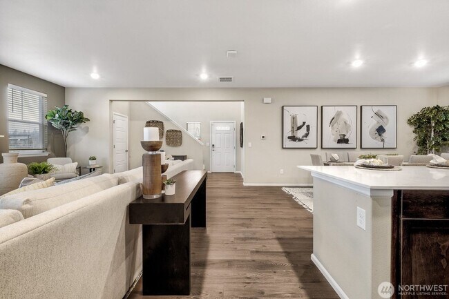 Photo - Beautiful 5-bedroom, 3-bath home offering 2,648 sq ft of comfortable living space on an east-faci...