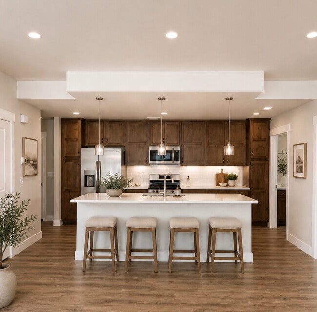 Photos have been virtually staged to help visualize the space. The condo is unfurnished. - 265 High Point Dr Unit #208