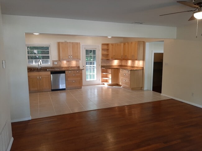 Enter the airy kitchen and open living space. - 2955 Fantasy Ln
