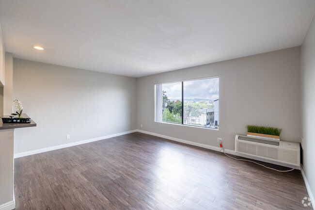 1BR, 1BA - 600SF - Living Room - Chateau Emelita Apartments