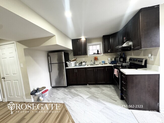 Photo - Spacious 3-Bedroom + Den Walk-Out Basement... Unit 2