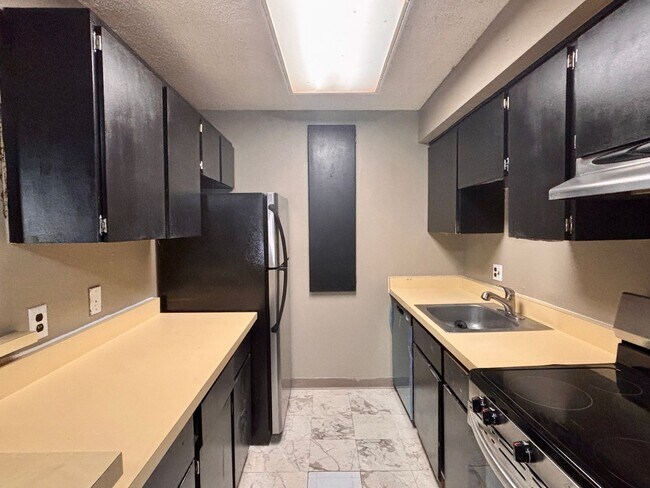 Photo - Spacious 2-Bedroom Condo in Denver's Monaco Lakes Community | $1,295/mo