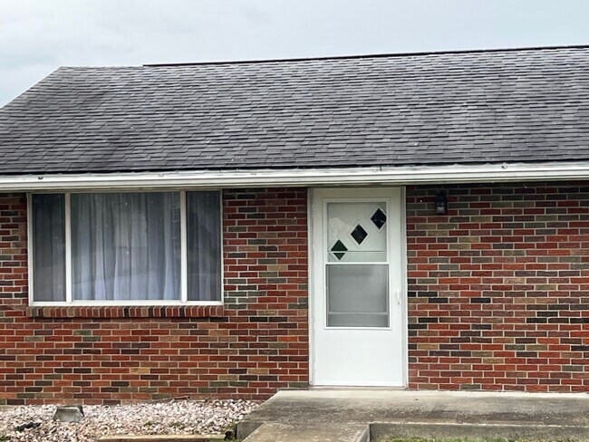 2 Bedroom 1 Bath Apartment with full basement and garage. Nice country setting . - 3356 County Road 22A Unit 1