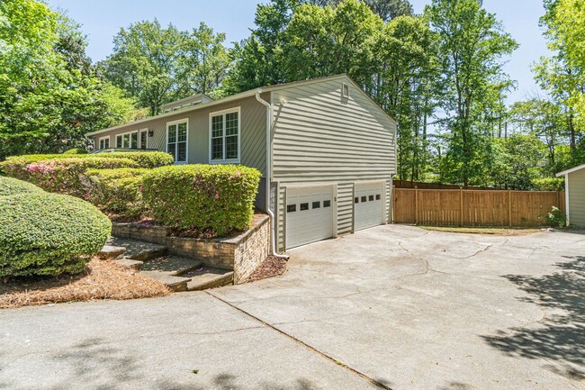 Photo - This beautifully updated Marietta, GA home offers 3 bedrooms and 2.5 bathrooms with an open floor...