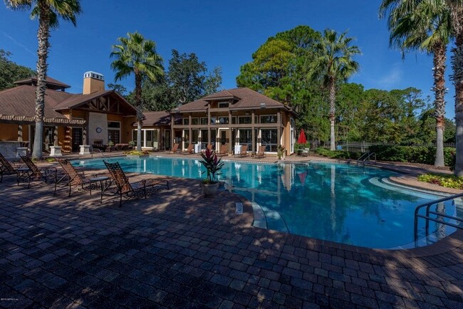 Relax and unwind lounging by one of two, beautiful pools. - 100 Fairway Park Blvd Unit 1103