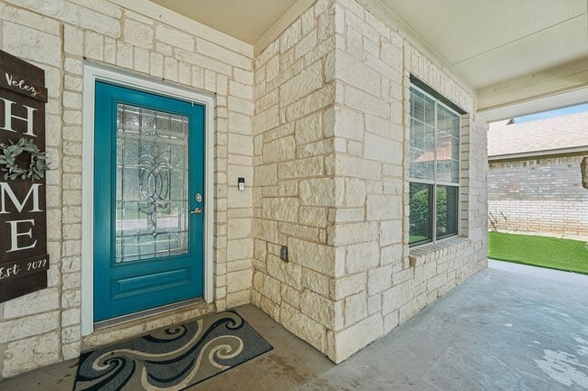 Photo - Massive 4 Bedroom, 2.5 Bathroom home in Blanco Vista - astro turfed front yard