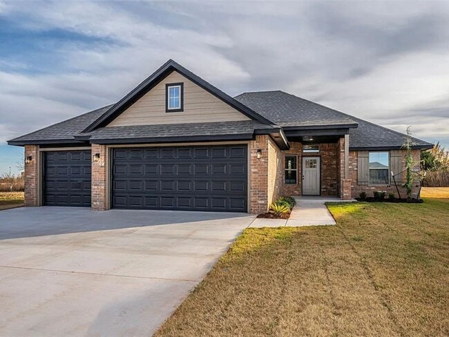 Photo - Modern 4-Bed, 2-Bath Mustang Home with 3-Car Garage!