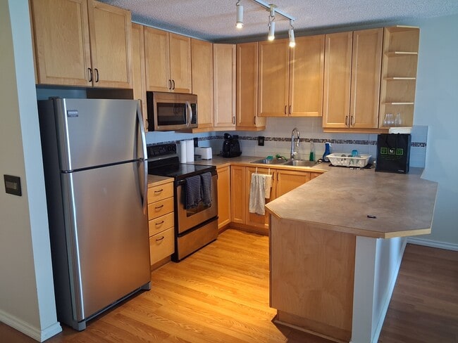 Photo - 112-214 14 Ave SE Unit 1