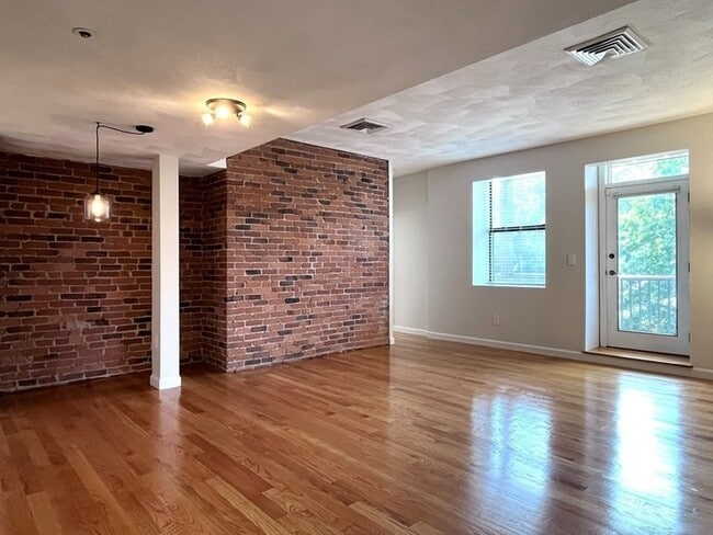 Photo - Updated 2BR / 2BA Condo with Private Deck & In-Unit Laundry at Academy Park Unit 306