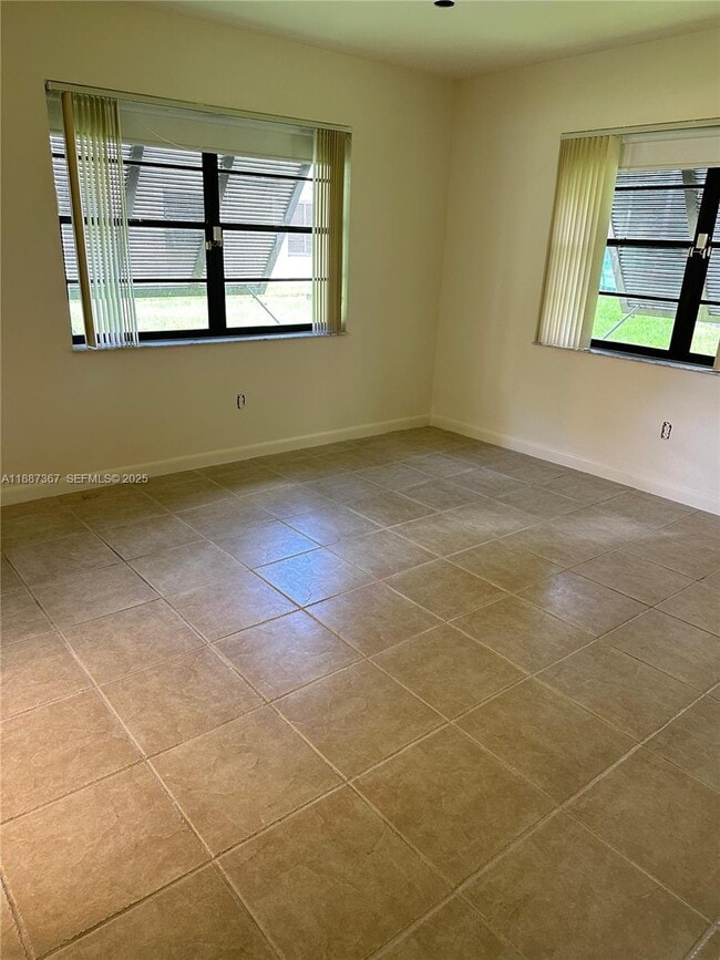 Building Photo - 7955 SW 86th St Unit 502