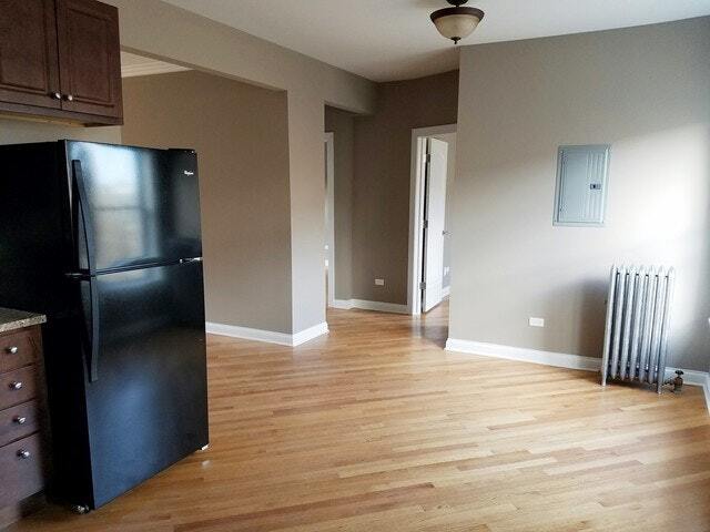 Building Photo - 1644 W Pratt Blvd Unit 1J
