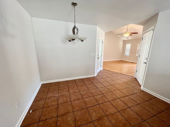 Photo - Screened in Porch and 2 Car Garage! House
