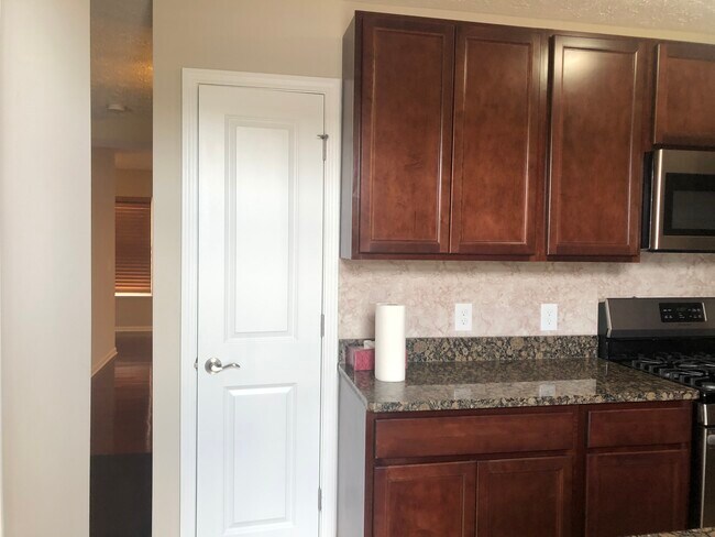 This townhome includes a modern kitchen - 1908 E 87th St