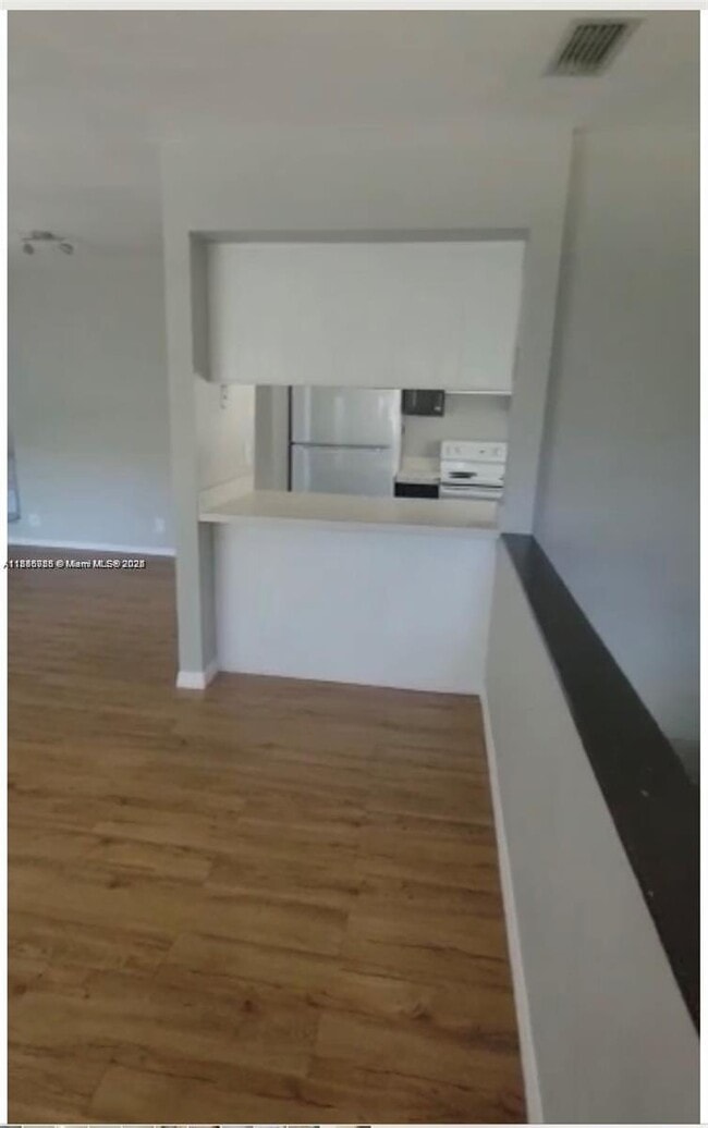 Building Photo - 8877 NW 28th Dr Unit 4-4 Rental