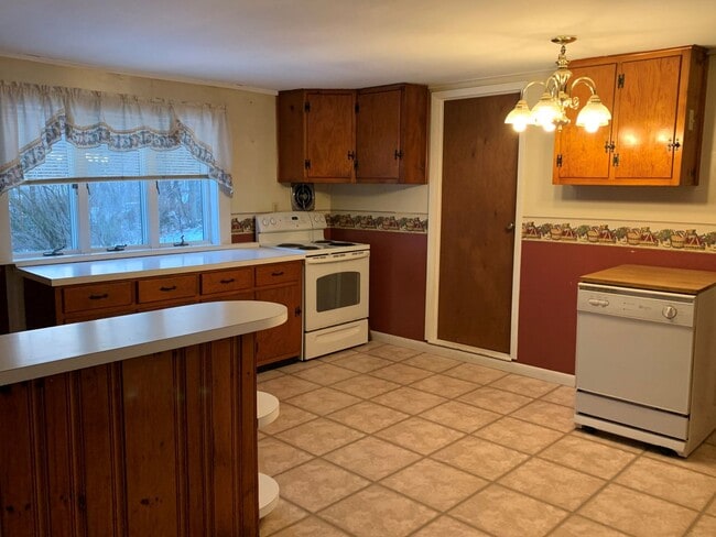 Photo - Multi-level 3-bedroom, 1-bath single-family home