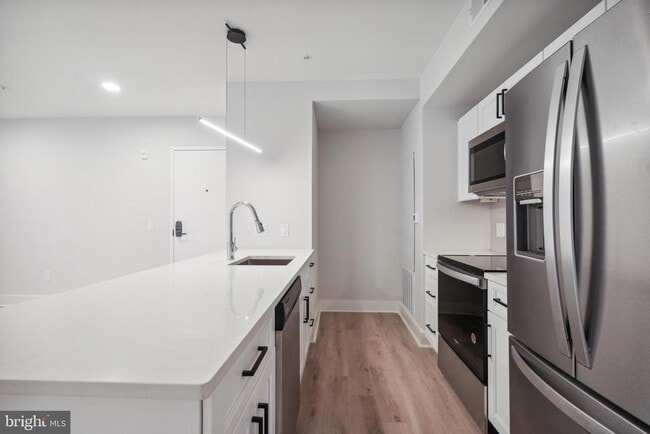 Building Photo - 1805 N Howard St Unit 201