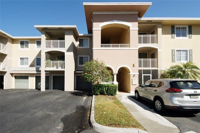 Building Photo - 6533 Emerald Dunes Dr Unit 206 Rental