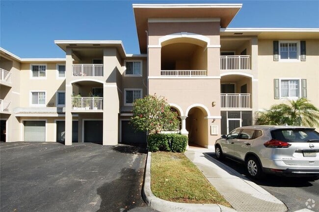 Building Photo - 6533 Emerald Dunes Dr Unit 206 Rental