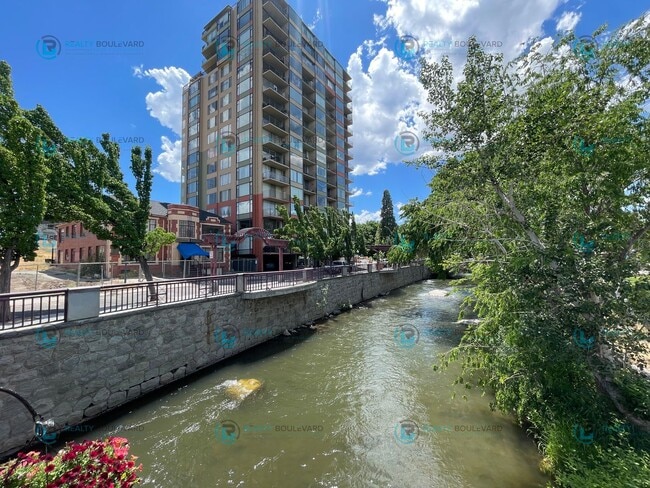 Building Photo - Exquisite 1-bedroom, 2-bathroom condo Overlooking the beautiful Truckee River with covered parking!