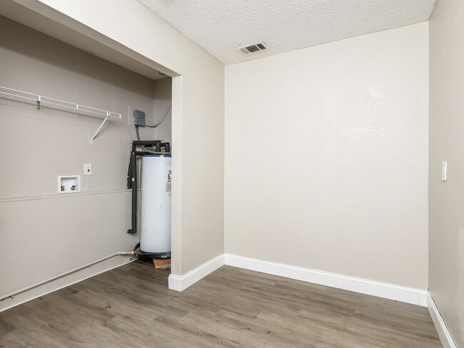 Photo - 3 BR/1BA | Newly Renovated Single Family Home | Screened in Patio and carpot | Huge backyard!