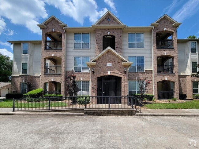 Building Photo - 6607 Lake Woodlands Dr Unit 313 Rental