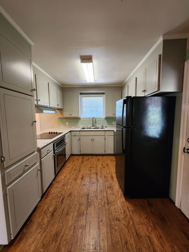 Photo - Charming 3BR/2BA Brick Home with Vintage Flair, Expansive Backyard & Walk to VSU!