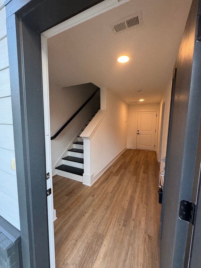 Photo - End unit overlooking courtyard, new townhome in gated community, pet friendly, 2 car garage