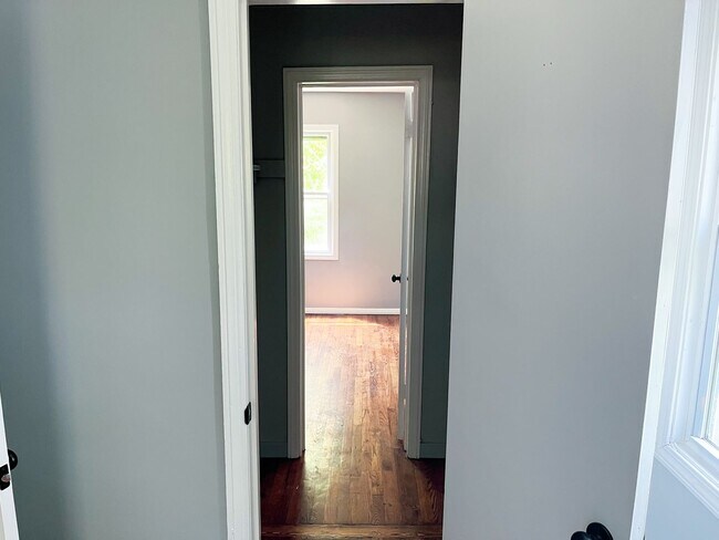 Photo - Move-In Ready 2BR Home w/ Refinished Hardwood Floors + Bonus Room Basement!