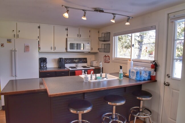 Kitchen and back door - 15385 Co Rd 306 Unit House