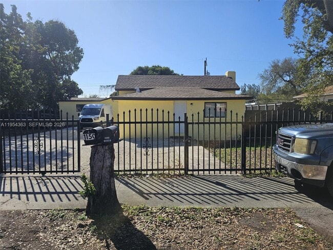 Building Photo - 1148 NW 100th St Unit 1