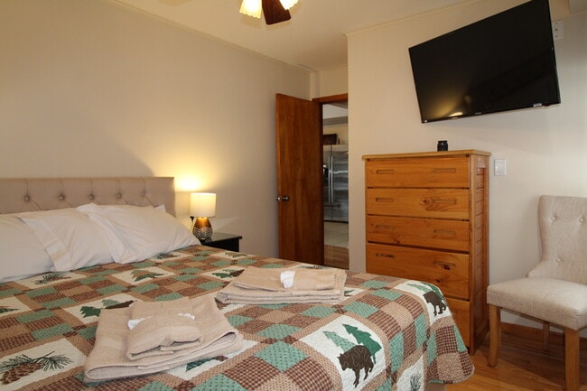 Bedroom #1 with flat screen Roku TV - 102 Holiday Ln Unit 2