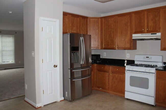 Photo - Beautiful 3-Level Townhouse with Finished Basement & Garage