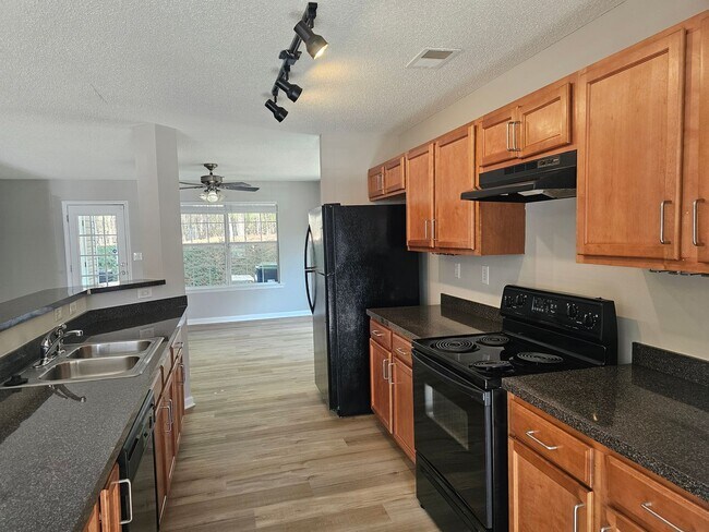 Photo - Move In special! 1/2 off the first Months rent!! 2 Bedrooms, 2.5 Baths Townhouse located in a Qui...
