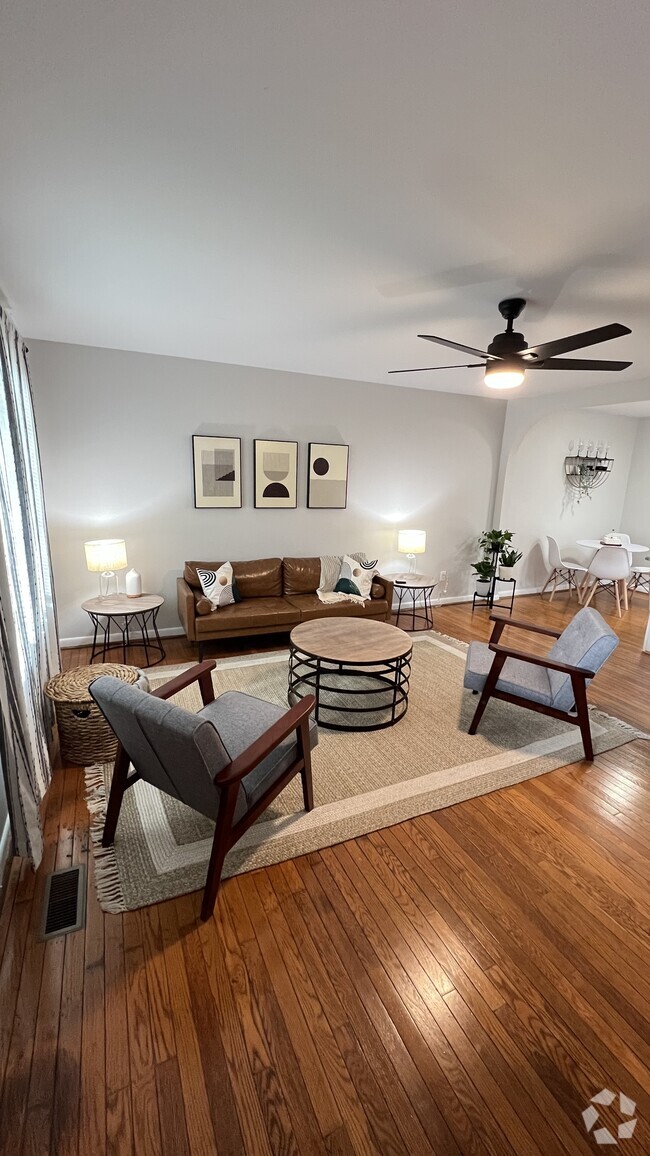 Partially Furnished Living Room - Furniture may Vary from items in Photo - 1007 Kinney St Rental
