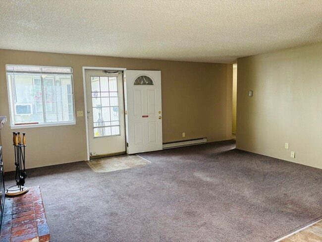 Photo - Bright 2 BR Carter Park Living with Fireplace, Carport, and Tons of Storage!