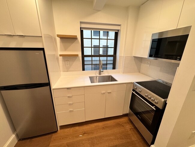 Building Photo - 1172 Massachusetts Ave Unit 218