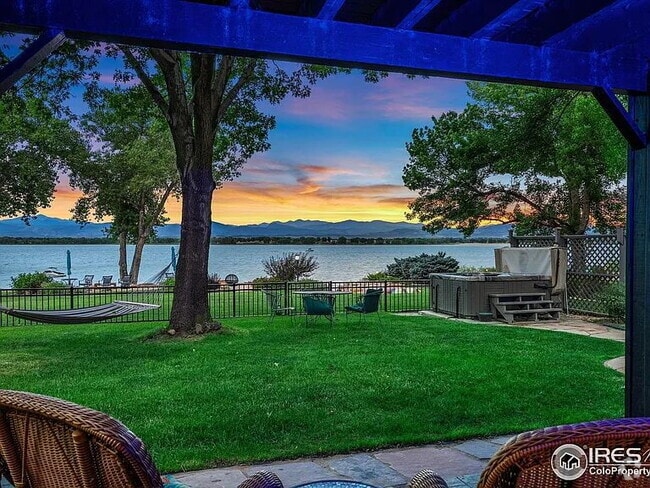 Building Photo - "Spacious 4-Bedroom Waterfront Haven with ... Rental
