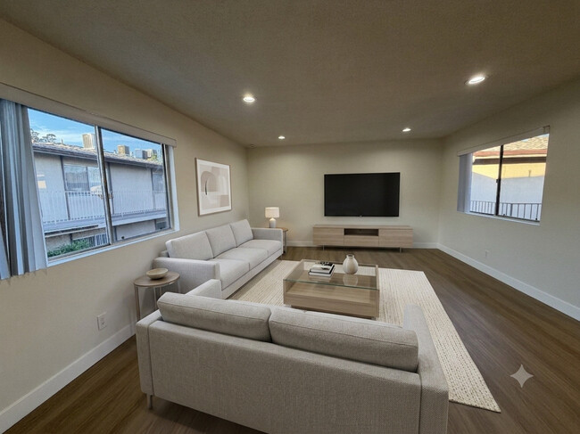 Living Room with Modern Wood Style Floors - The Huntington Sunset